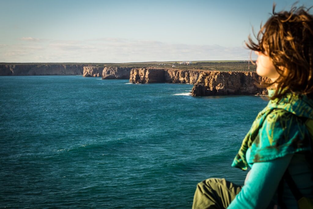 Woman breathing by the ocean